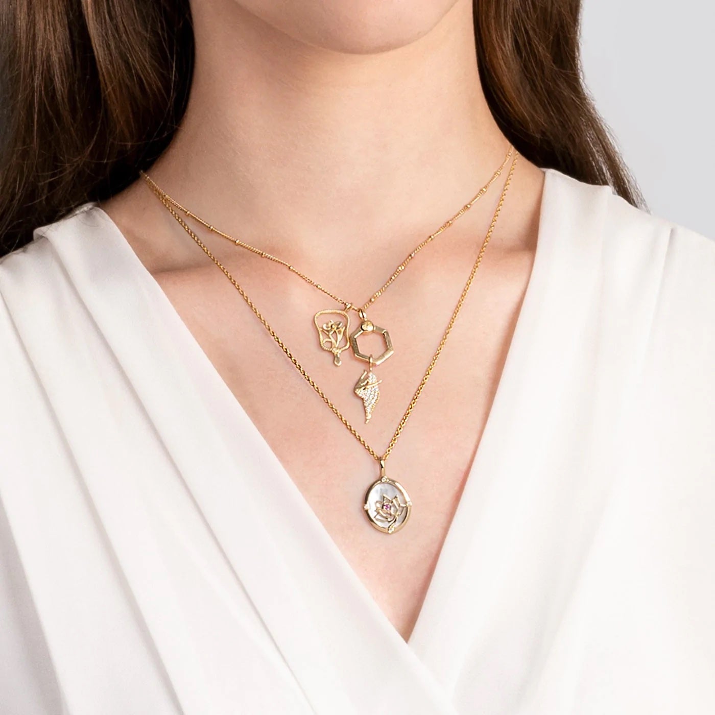 Gold lotus charm clearance